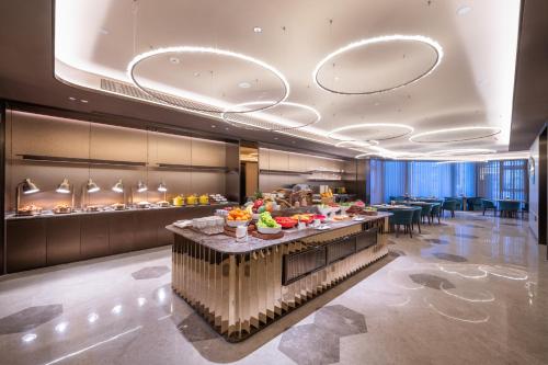 Fotografie z fotogalerie ubytování Orange Crystal Qingdao Taidong Pedestrian Street Yan'an Third Road Hotel v destinaci Čching-tao