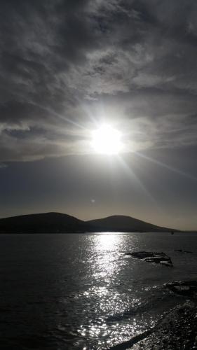 a sun setting over a body of water at Horizon View Lodge Bed and Breakfast Glanleam Road Knightstown Valentia Island County Kerry V23 W447 Ireland in Valentia Island
