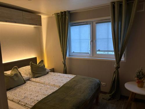 Ένα ή περισσότερα κρεβάτια σε δωμάτιο στο Korzkiewka