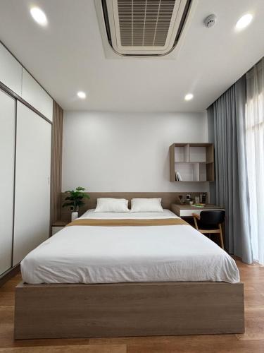 En eller flere senge i et værelse på SQUIRRELHOME District8