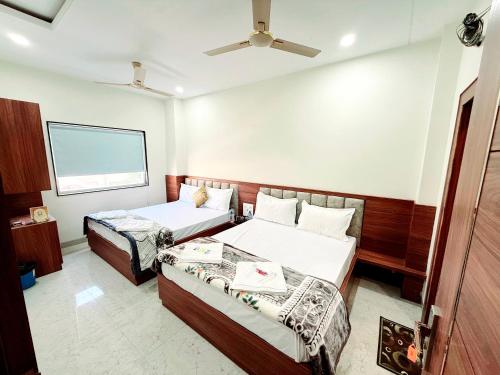 Voodi või voodid majutusasutuse Hotel Babylon Elegance near krishna janam bhoomi toas