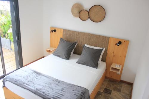 Postel nebo postele na pokoji v ubytování Rosea - Gayarticaz Reunion