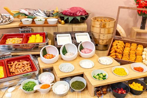 a table topped with lots of different types of food at Grand Lectore Yugawara - TKP Hotels & Resorts in Yugawara