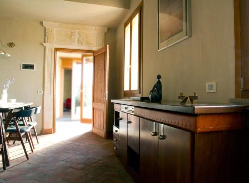 Kuchyňa alebo kuchynka v ubytovaní Tuscany Forever Famiglia Apartments