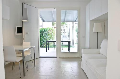 Postel nebo postele na pokoji v ubytování Eco Apartments Cervia