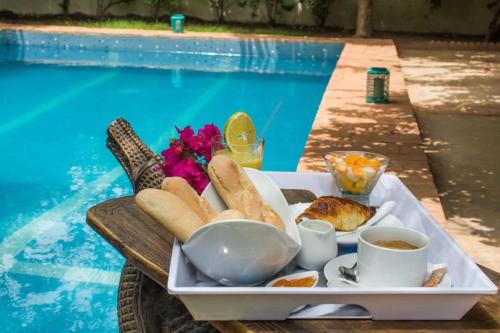 The swimming pool at or close to Umoja Guesthouse II