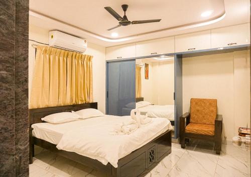 En eller flere senge i et værelse på Sterlinge Homestay