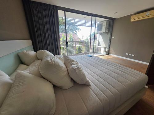 Postel nebo postele na pokoji v ubytování Avatara Beachfront