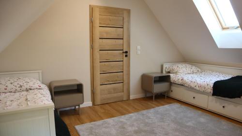 Ένα ή περισσότερα κρεβάτια σε δωμάτιο στο Chill domek