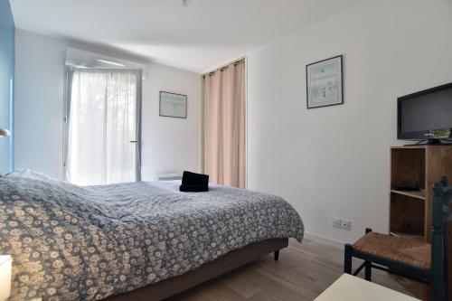 Ένα ή περισσότερα κρεβάτια σε δωμάτιο στο Chez Josse - A 10 min de St-Cast