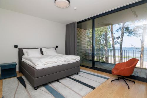 Ένα ή περισσότερα κρεβάτια σε δωμάτιο στο Reute Residentsid