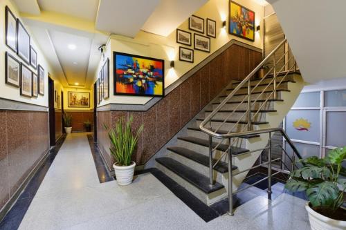 TV a/nebo společenská místnost v ubytování FabHotel Tip Top