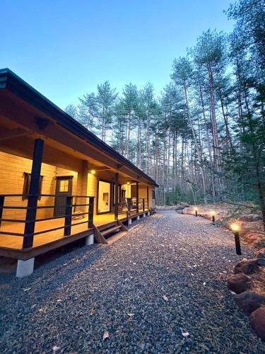 a building with lights on the side of it at Second House LUONTO in Tsumagoi