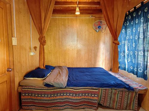 Giường trong phòng chung tại PaoDzung homestay Tả Van