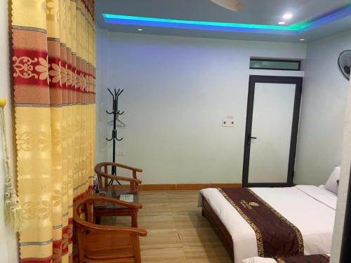 Ένα ή περισσότερα κρεβάτια σε δωμάτιο στο Ciao Homestay