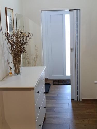 a room with a white counter and a door at Apartment Krnov in Krnov