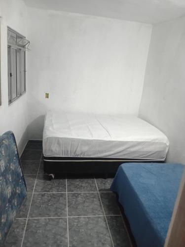 Postel nebo postele na pokoji v ubytování Chácara silva