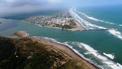 an aerial view of a beach and the ocean at Posada Casa Bugambilias in Tecolutla