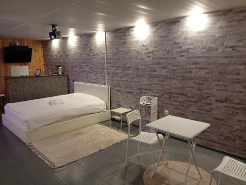 Η κουζίνα ή μικρή κουζίνα στο Le Loft