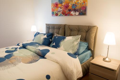 Een bed of bedden in een kamer bij La Mia Casa Romana