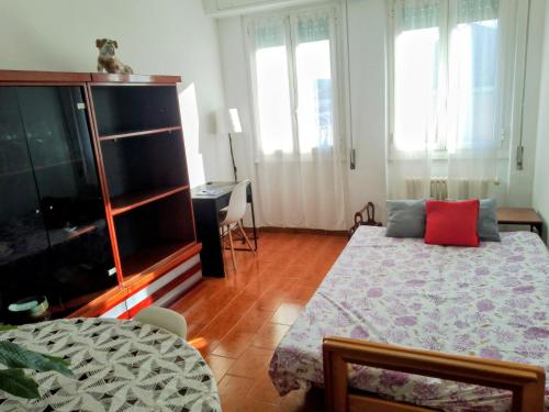 Ένα ή περισσότερα κρεβάτια σε δωμάτιο στο Ca' Felisi