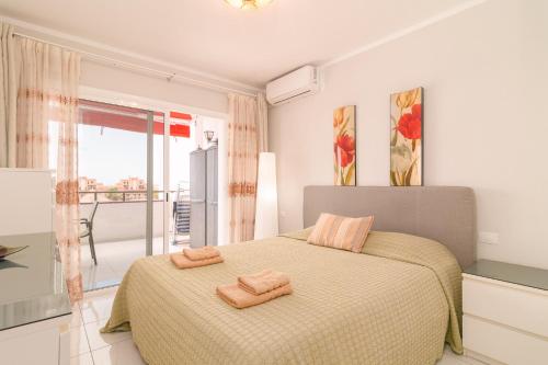 Spacious 2 bdr apartment heated pool, garage