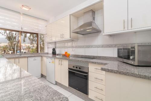 Spacious 2 bdr apartment heated pool, garage