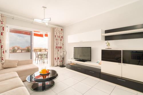 Spacious 2 bdr apartment heated pool, garage