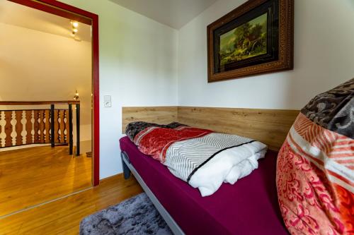 Ένα ή περισσότερα κρεβάτια σε δωμάτιο στο Fewo Heidenheim