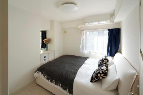 Modern 2DK Apt Umeda Area 1 min to Metro Direct from KIX Balcony & Luxury Comfort