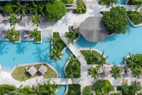 La alberca dentro o cerca de Pullman Khao Lak Resort