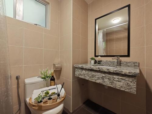 Ένα μπάνιο στο Desaru Black Beach Sky Mirror Resort