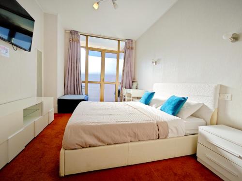 Voodi või voodid majutusasutuse Xixi B&B toas