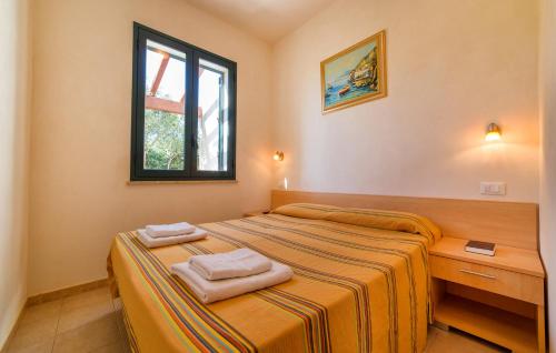 Ένα ή περισσότερα κρεβάτια σε δωμάτιο στο Lilybeo Village