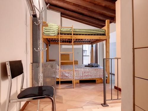 Ένα ή περισσότερα κρεβάτια σε δωμάτιο στο Appartamenti Giove by Ospitaci