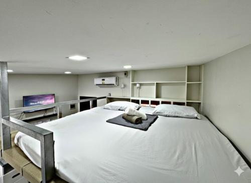 Ένα ή περισσότερα κρεβάτια σε δωμάτιο στο M&R Homes Block 49 Lot 20 Bella Vita Bangad Cabanatuan Nueva Ecija