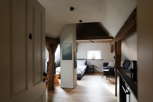 Χώρος καθιστικού στο Lehm & Fachwerk Dach-Apartment - Claycation