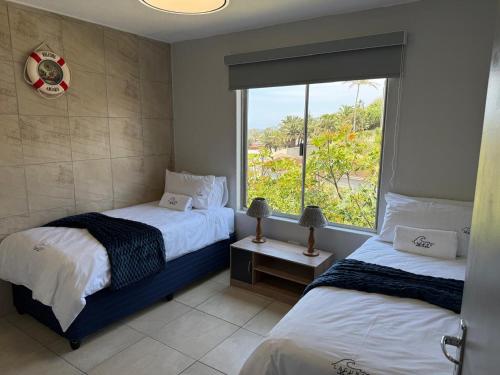 En eller flere senge i et værelse på 92 Laguna La Crete