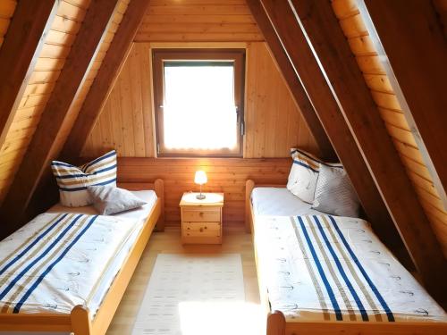 Ένα ή περισσότερα κρεβάτια σε δωμάτιο στο Haus Alma