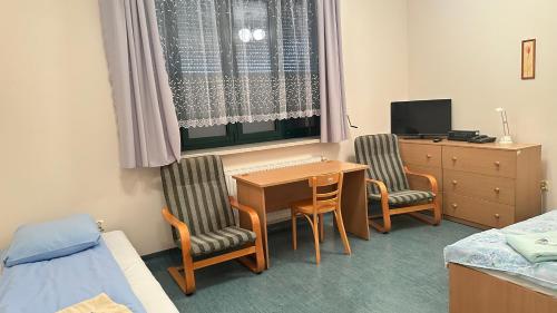 Osiedle Studenckie w Słubicach的电视和/或娱乐中心