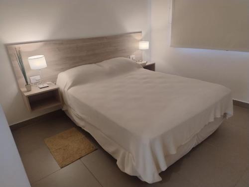 Ένα ή περισσότερα κρεβάτια σε δωμάτιο στο Altos deMoreno - solo familias o parejas