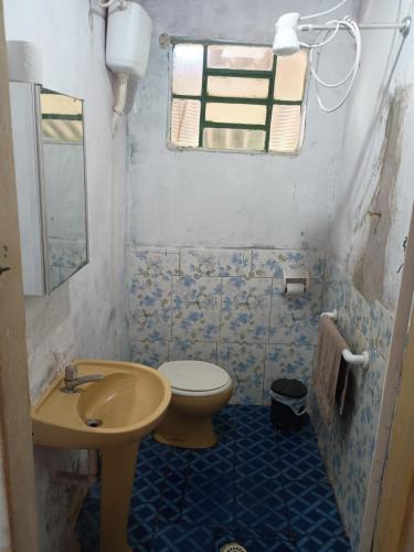 Un baño de Cantinho da paz