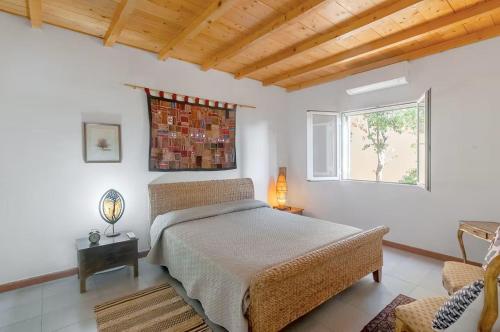 Ένα ή περισσότερα κρεβάτια σε δωμάτιο στο La Dimora del Marinaio - HelloElba