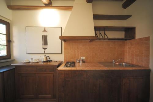 Η κουζίνα ή μικρή κουζίνα στο Antico Borgo Delle Rose