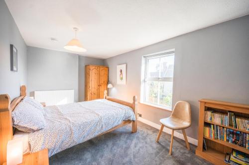 Ένα ή περισσότερα κρεβάτια σε δωμάτιο στο The Knoll, Alderton