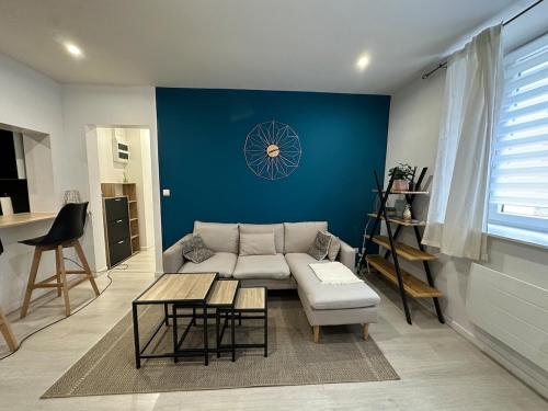 Χώρος καθιστικού στο Appartement moderne et cosy - Le Refuge du Bonhomme