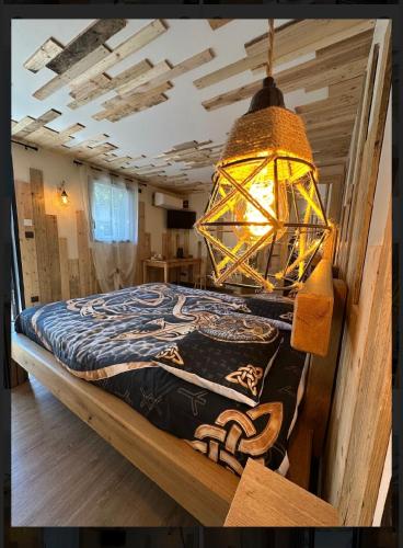 Voodi või voodid majutusasutuse Le valhalla vidar toas