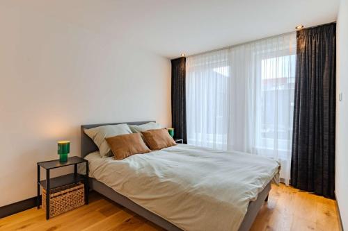 Кровать или кровати в номере Haarlem Hart