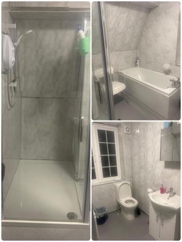 a bathroom with a shower and a toilet and a sink at Firs Drive in Cranford