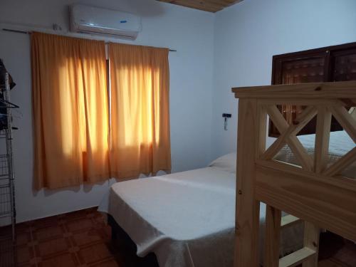 Postel nebo postele na pokoji v ubytování Los Fresnos